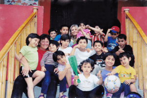 A group of children posing for the camera.